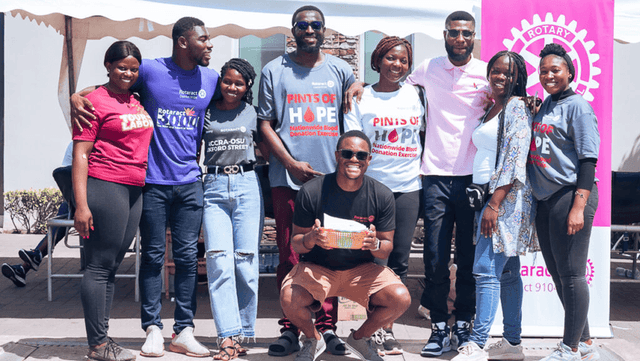 Youth volunteer team members at community outreach event